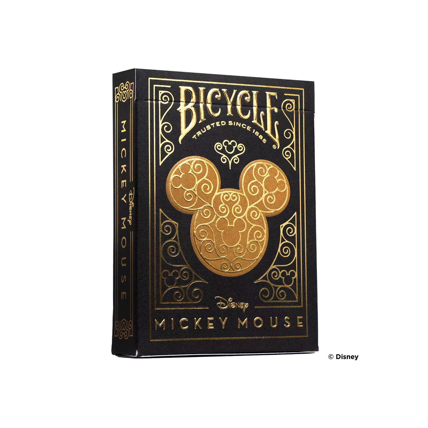Eine Bicycle Ultimate Bicycle Disney Mickey Mouse Black and Gold Kartenschachtel steht mit sichtbarer Vorderseite vor einem weißem Hintergrund.